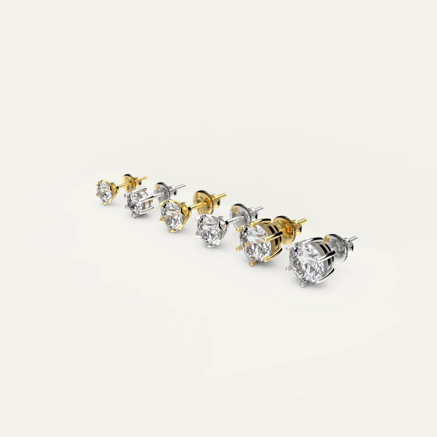 Zenith Collection by Goldmacher – Visual guide comparing carat sizes of round moissanite stud earrings in 925 silver and gold settings