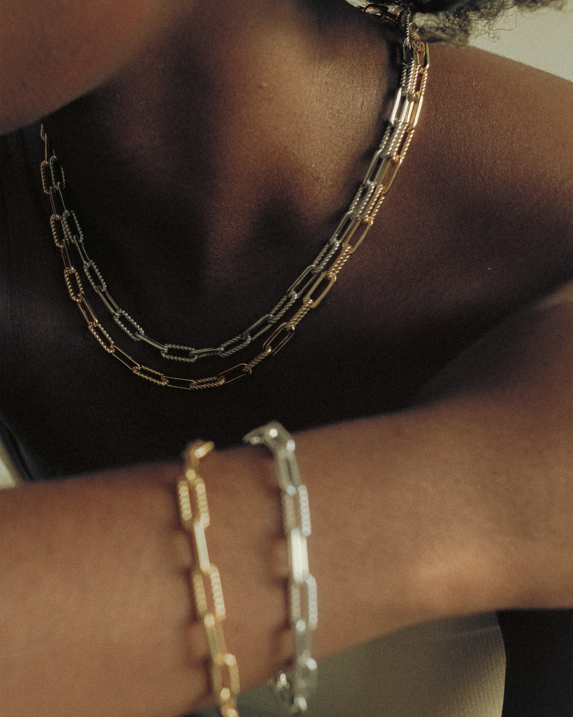Bold Chain Necklace by Goldmacher – 18K gold-plated elongated link necklace shown in close-up on model