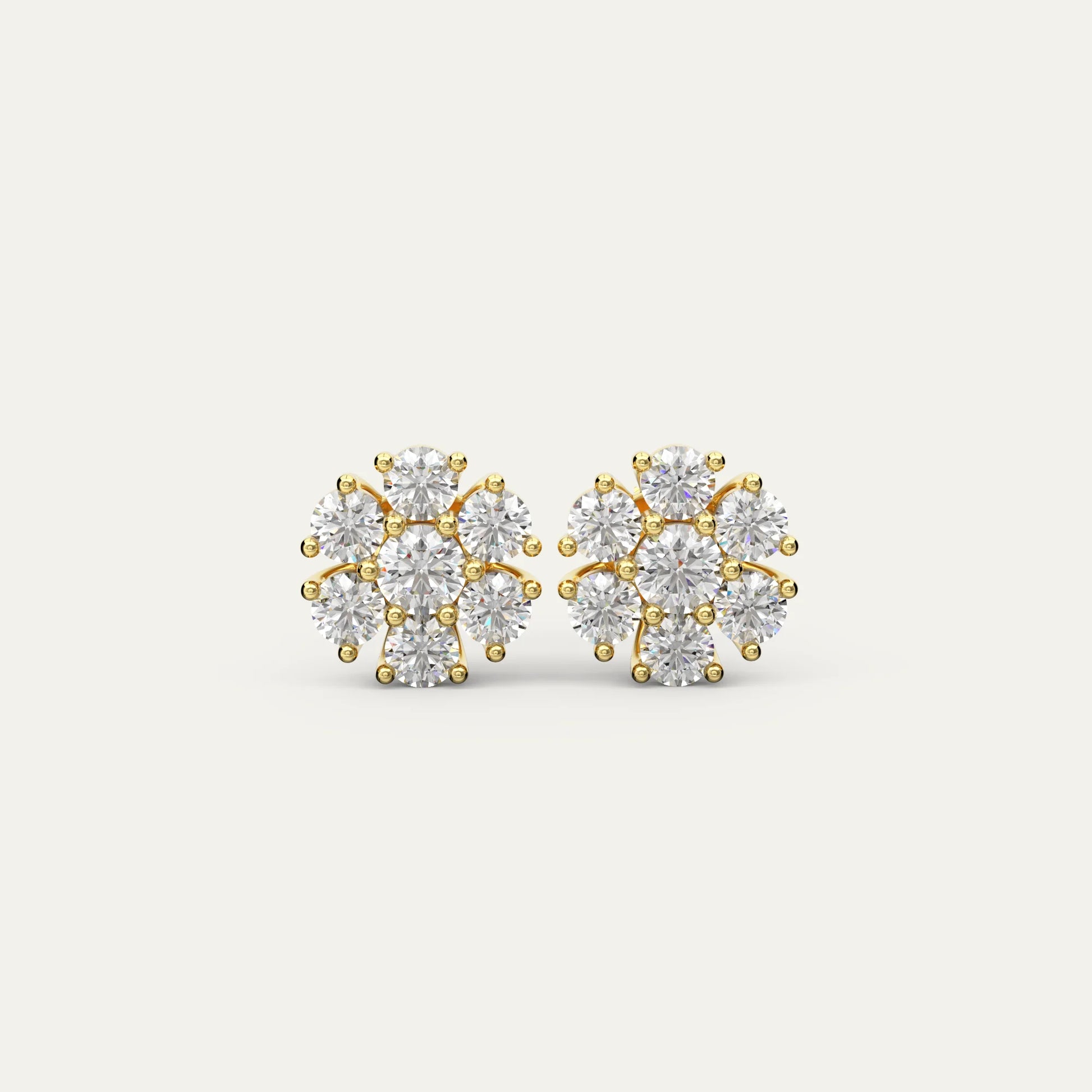 Goldmacher Calytrix gold-plated 18k cluster earrings with round moissanite stones in a floral design