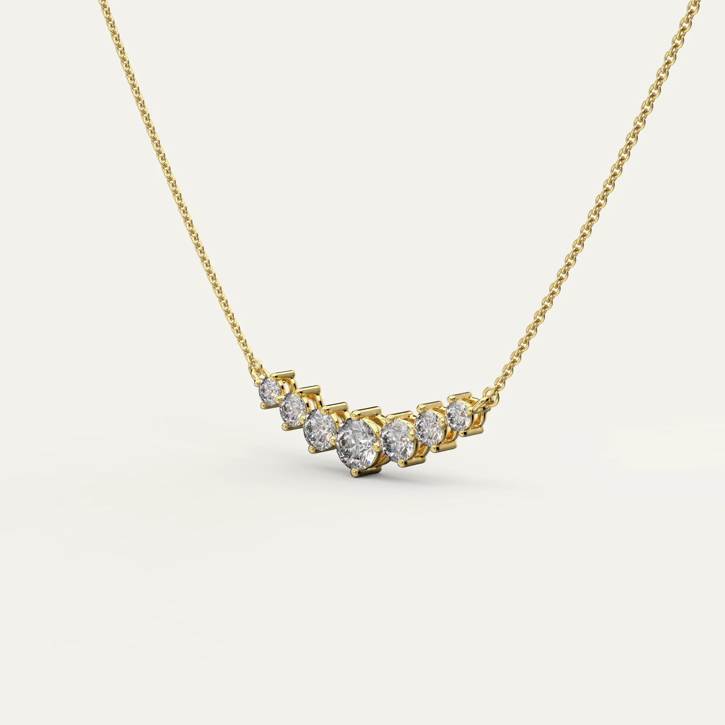 Goldmacher Felis 18k Gold Graduated Curved Bar Necklace – 0.5ct Round Moissanite Stones for Layered Sparkle and Delicate Everyday Luxury.