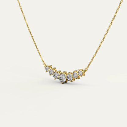 Goldmacher Felis 18k Gold Graduated Curved Bar Necklace – 0.5ct Round Moissanite Stones for Layered Sparkle and Delicate Everyday Luxury.