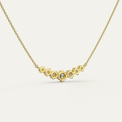 Goldmacher Felis 18k Gold 0.5ct Moissanite Graduated Bar Necklace – Heirloom-Quality Curved Design for Minimalist Bridal or Symbolic Gifts.