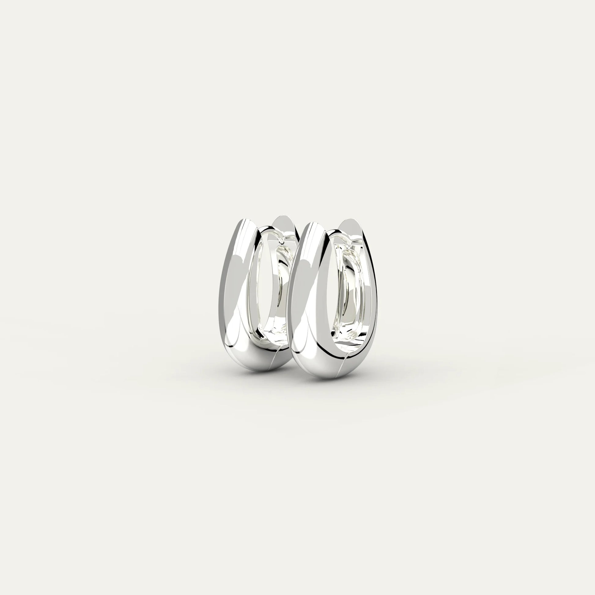 Rhodium Silver Molten Drop Earrings – Smooth Curved Hoop in Sculptural Metallic Form